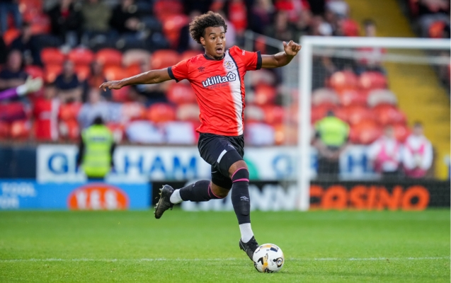 Utilita logo on Luton Town front of shirt player