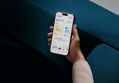 Someone holding a phone that's displaying the award-winning My Utilita App, helping customers better manage their energy.  